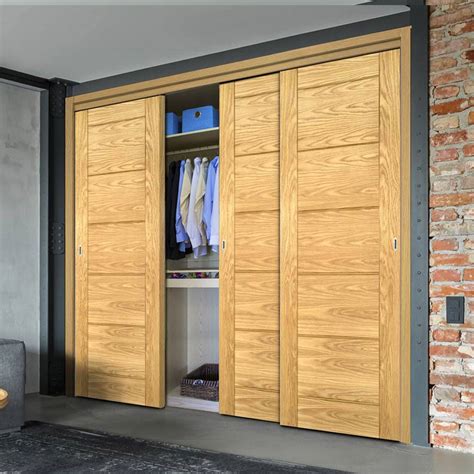 Three Sliding Wardrobe Doors And Frame Kit Seville Oak Panel Door Pr