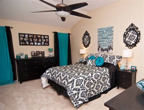 Loving this amy butler wallpaper. Finally finished my master bedroom! Tiffany blue, black ...