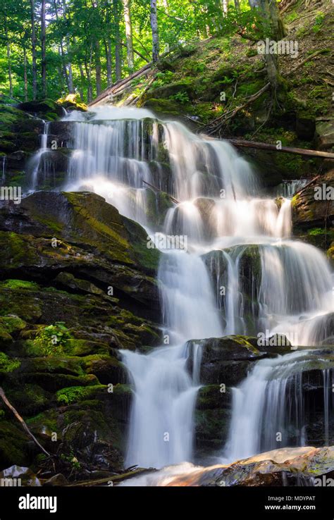 Cascades Of Big Waterfall In Forest Beautiful Summer Scenery At