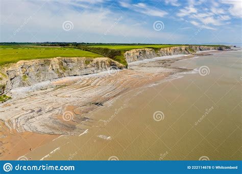Aerial View Of Dramatic Limestone Cliffs And Coastline At Southerndown