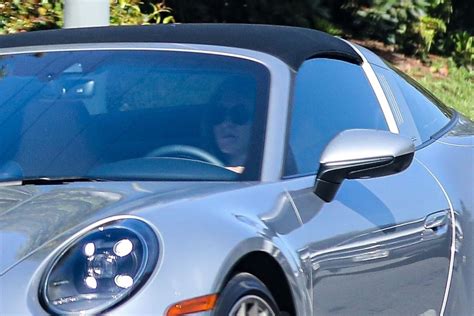 Jennifer Aniston Out Driving In Her Porsche 911 Targa In West Hollywood