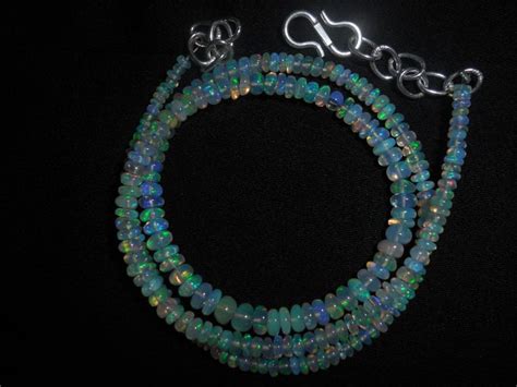 Natural Multi Fire Ethiopian Welo Opal Smooth Rondelle Beads Top
