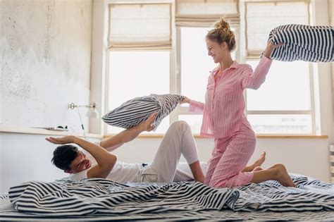 Free Photo Young Pretty Couple Having Fun On Bed In Morning Stay Together At Home Alone