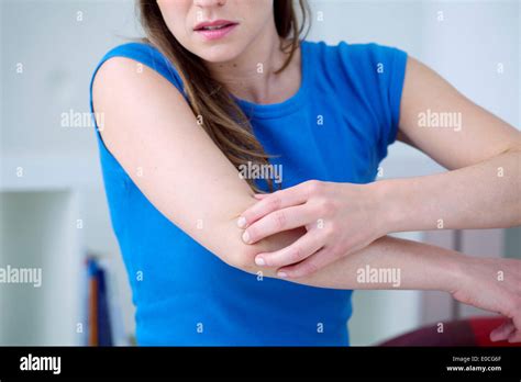 Itching In A Woman Stock Photo Alamy
