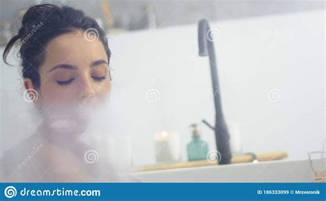 Close Up Sensual Woman Lying In Bathtub With Foam Romantic Girl