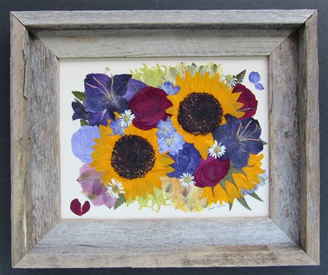 Funeral Spray of Sunflowers and other flowers gathered at a funeral