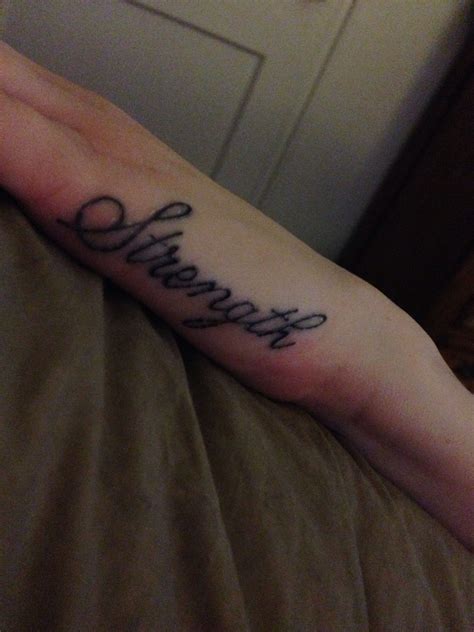 A collection of articles about finger tattoos Hand Tattoo - Strength | Strength tattoo, Rose tattoos, Hand tattoos