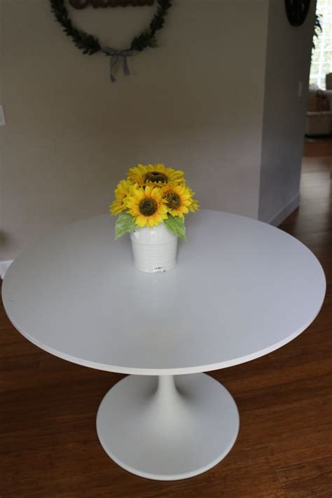 Dining tables are hot spots even when there's no food on them. White ikea tulip round dinning table for Sale in Federal ...