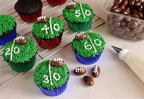 Football cake pops my son loves football! Be Different...Act Normal: Football Cupcakes [Super Bowl ...