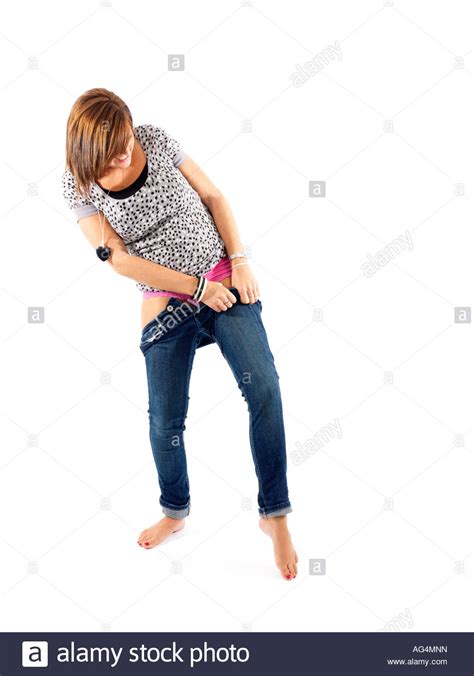 Pulling On Tight Jeans Cut Out Stock Images Pictures Alamy