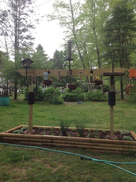 Bird & squirrel food, feeders & houses birdbaths & accessories mason bee & bat houses cranes, hooks, poles & hangers rain domes. bird feeder landscaping ideas - Google Search in 2020 ...