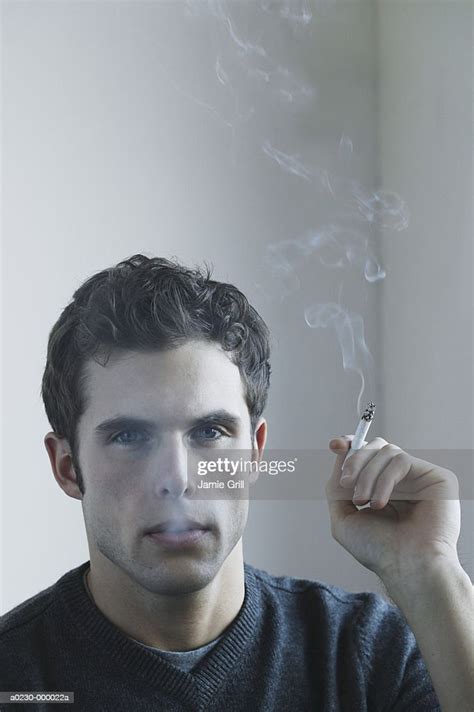 Man Smoking High Res Stock Photo Getty Images