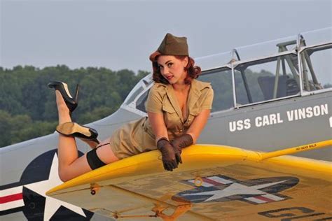 Collection of aviation pin up and nose art copyrights belong to their respective owners. 1940's Style Pin-Up Girl Lying on a T-6 Texan Training Aircraft Photographic Print at AllPosters.com