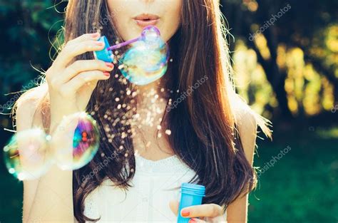 Girl Blowing Bubbles — Stock Photo © Asife 68265423