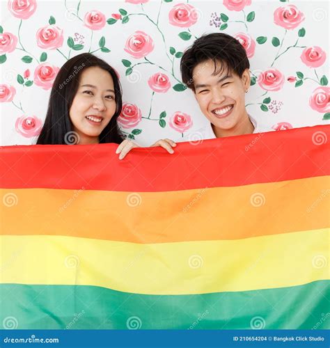 Lgbtq Couple Lovers A Handsome Girl As A Man Or Femme Holding The