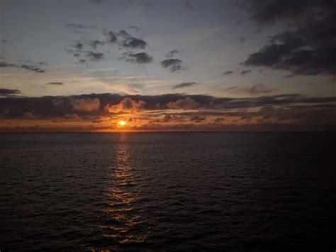 Wallpaper Sea Horizon Clouds Sun Sunset Dark Hd Widescreen High Definition Fullscreen