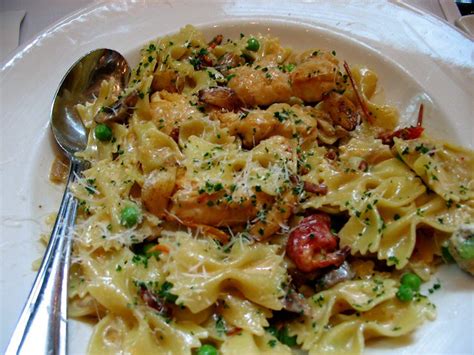 But with the overnight brining in a roasted garlic and lemon juice marinade, the breast meat was perfectly moist, even cooked breast up. Farfalle with chicken and roasted garlic - Cheesecake Factory | Flickr - Photo Sharing!