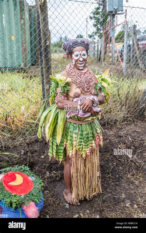 Half Naked Woman With Face Painting And Traditional Costume At Mount Hagen Cultural Show Papua
