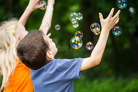 Kids Blowing Bubbles Stock Photo Image Of Hobby Park 32357324