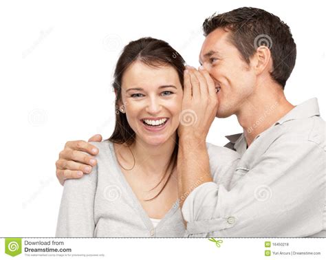 Young Man Whispering A Secret To A Cute Woman Stock Photo - Image of ...