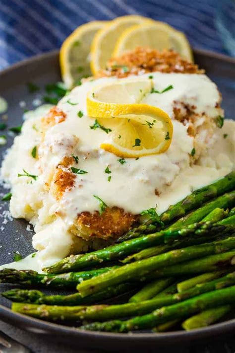 Lift a piece of chicken out of the buttermilk. Panko Chicken with Lemon Cream Sauce (So Easy!) - Oh Sweet ...