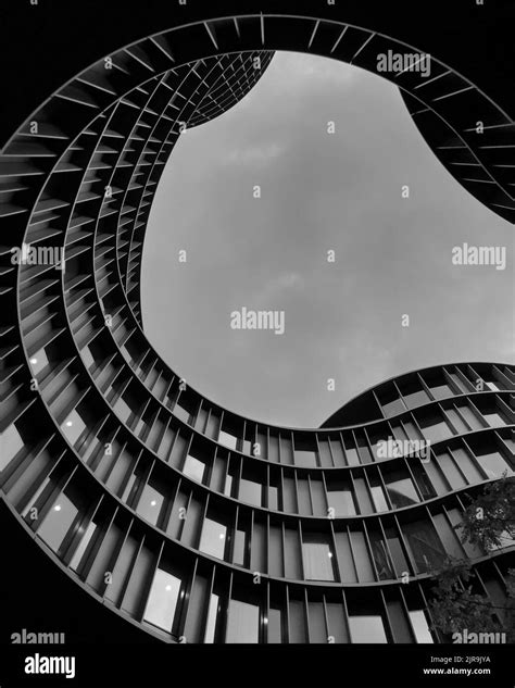 A Round Shaped Building In Copenaghen Observed From Below In Black And