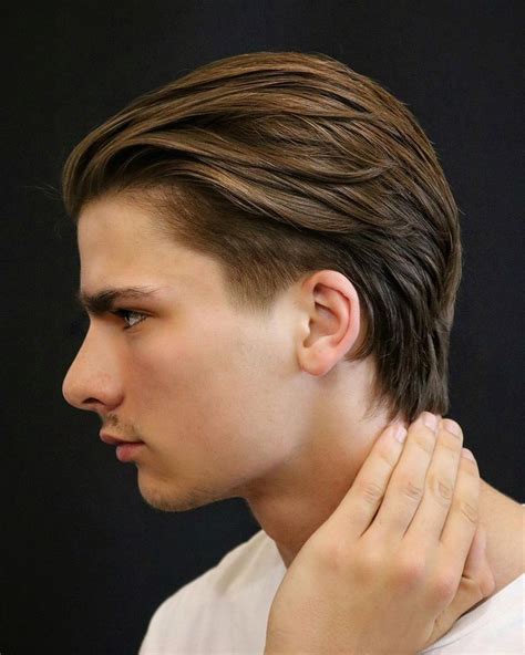 The Ear Tuck Haircut A Suave Style For Modern Day Gentlemen Pelo Largo De Hombre Peinados