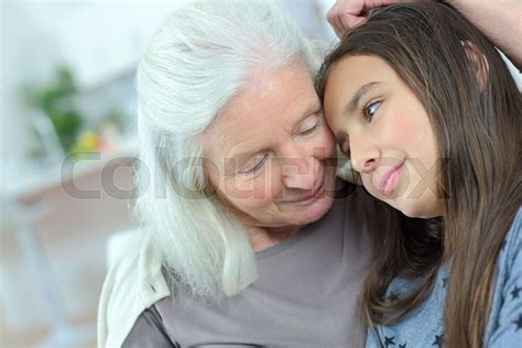 Loving Grandmother Comforting Her Granddaughter Stock Image Colourbox
