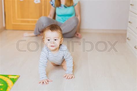 Crawling Funny Baby Boy Indoors At Stock Image Colourbox