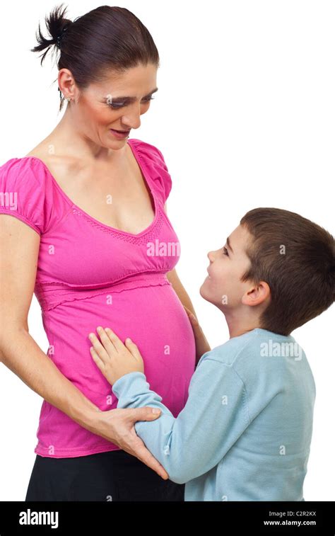 Pregnant Mother Having Conversation With Her Son The Boy Touching Her