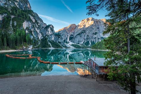 Wooden Hut And Lago Di Braies In Dolomites At Sunrise Stock Image