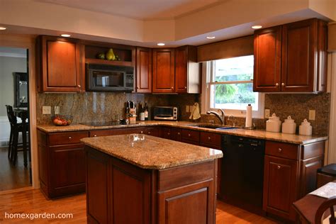 Have your kitchen cabinets gone from new to vintage to what you consider an eyesore? Perfect Kitchen Paint Ideas With Cherry Cabinets