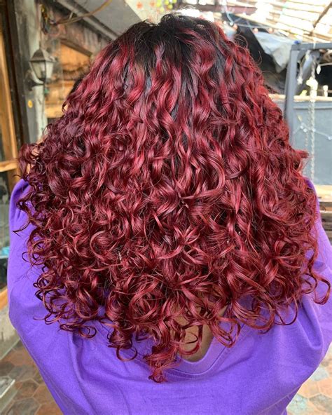 rock your look stunning ways to style red brown curly hair click here for inspiration