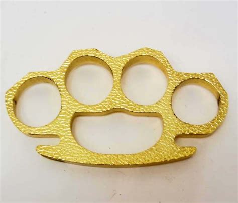 Brass Knuckles Paperweight
