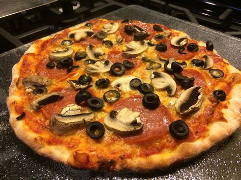 Homemade Pepperoni Mushroom And Olive Pizza Food