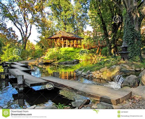 Japanese Garden With A Water Pool Pavilion And Wooden
