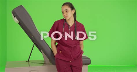 a doctor stares off into the distance on green screen stock footage distance stares doctor