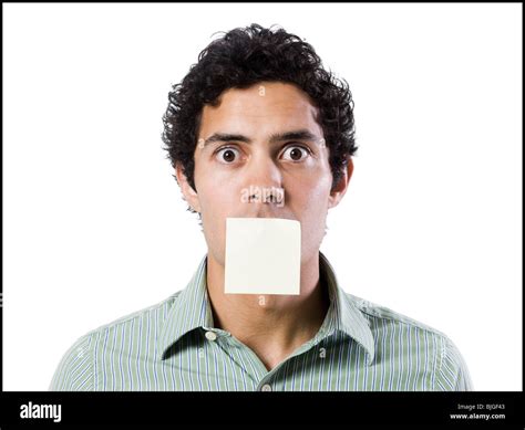 Man With A Post It Note Over His Mouth Stock Photo Alamy