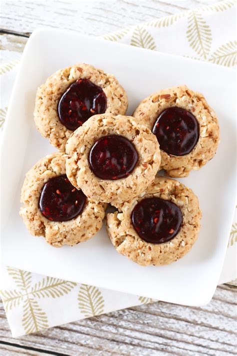 57 best thumbprint cookies to bake for your holiday cookie exchange. gluten free vegan raspberry thumbprint cookies - Sarah ...