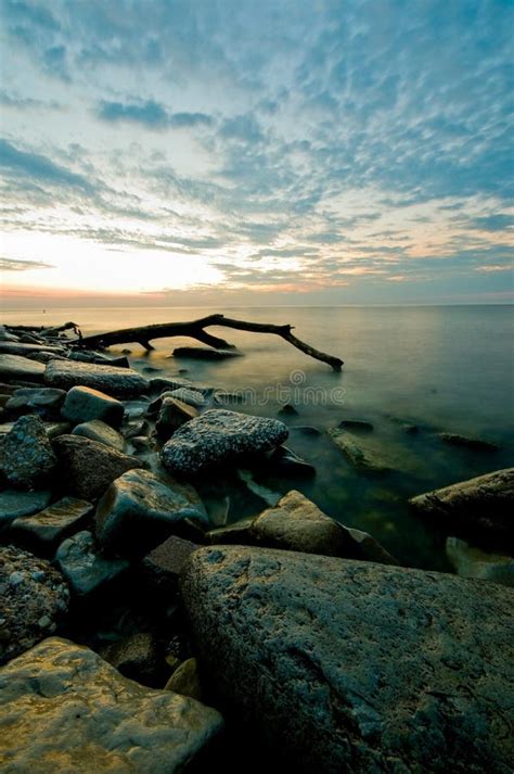 Lake Michigan Sunrise Stock Image Image Of Rocks Wood 36831289