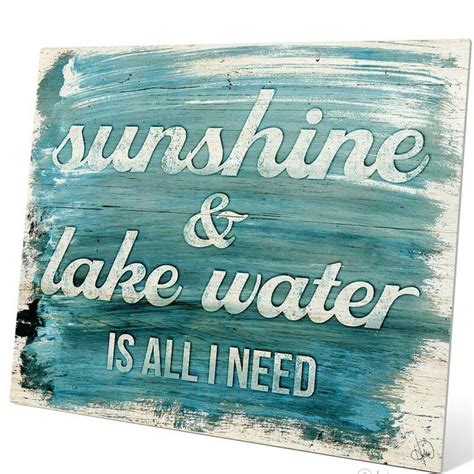A Wooden Sign That Says Sunshine And Lake Water Is All I Need