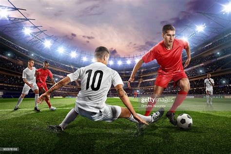 Soccer Players In Action On Soccer Stadium High Res Stock Photo Getty