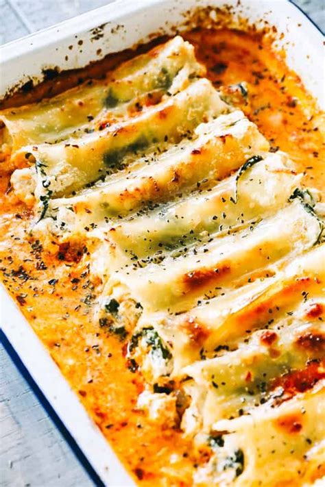 Cannelloni Pasta Tubes Packed With A Cheesy Ricotta Chicken Filling Topped With A Creamy Toma
