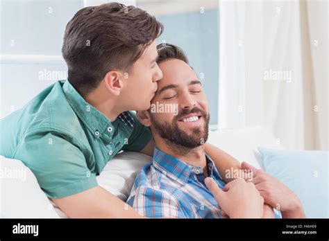 Smiling Homosexual Couple Men Kissing Each Other Stock Photo Alamy