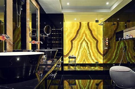 15 Refined Decorating Ideas In Glittering Black And Gold Gold Bathroom