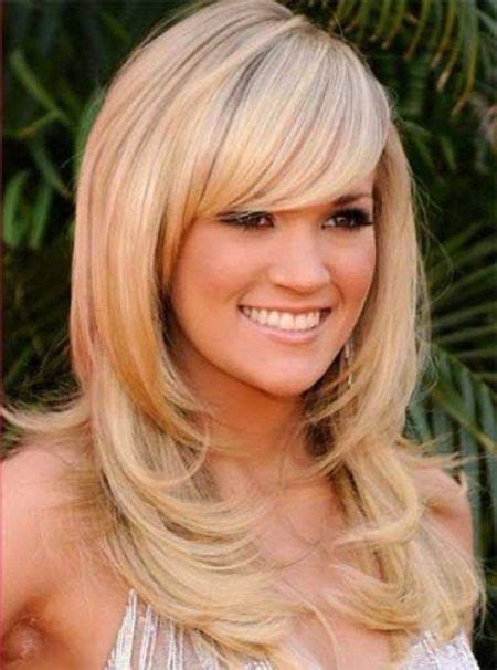 Stylish Hairstyles For Oval Face With Regard To Feathered Side Swept