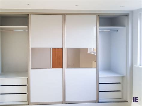 Fronted by beautifully finished sliding. Fitted Wardrobes Kensington Chelsea London | Sliding Doors