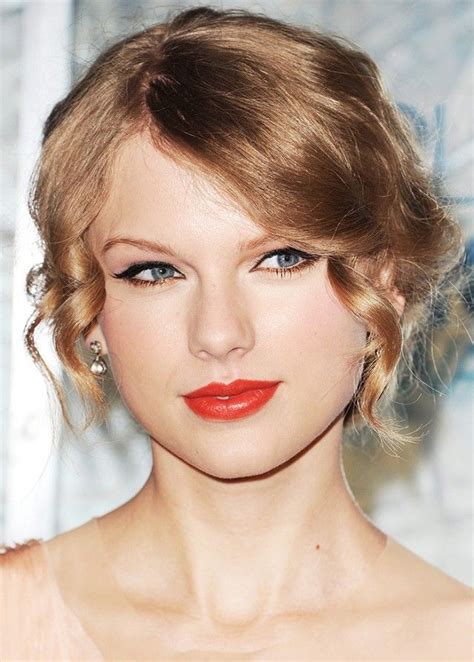 Here Swift Sets Off The Pinkish Tones Of This Red Lipstick With A Smudge Of Copper Liner Along