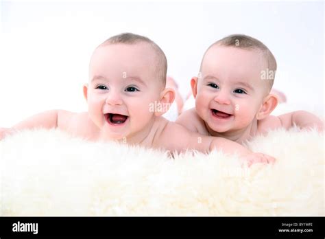 Twin Baby Girls Smiling Stock Photo Alamy