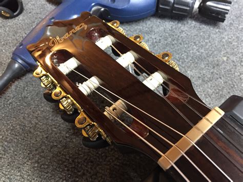 Restringing a guitar is like inspecting its tone. Ibanez Classical in for a restring - Guitars United